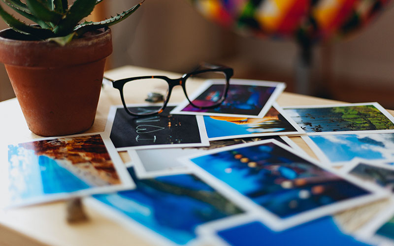 Printed photos on table top