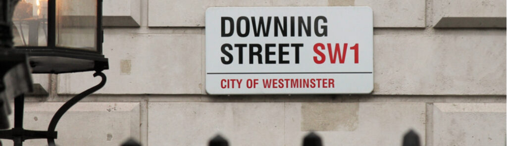 An image of the street sign of Downing Street, London