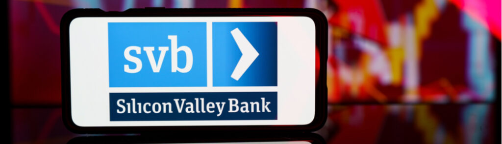 a phone showing an image of the Silicon Valley Bank logo