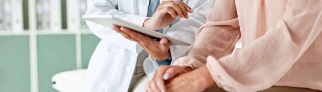 A doctor talking to a patient.
