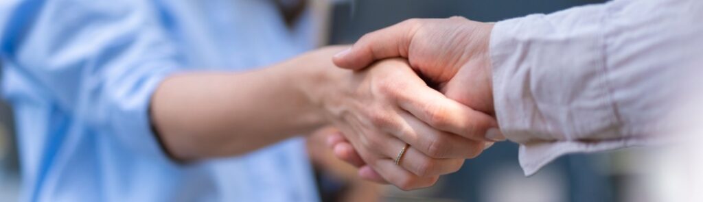 Two people shaking hands