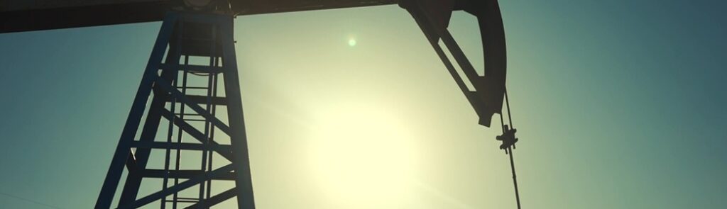 A silhouette of an oil pump.