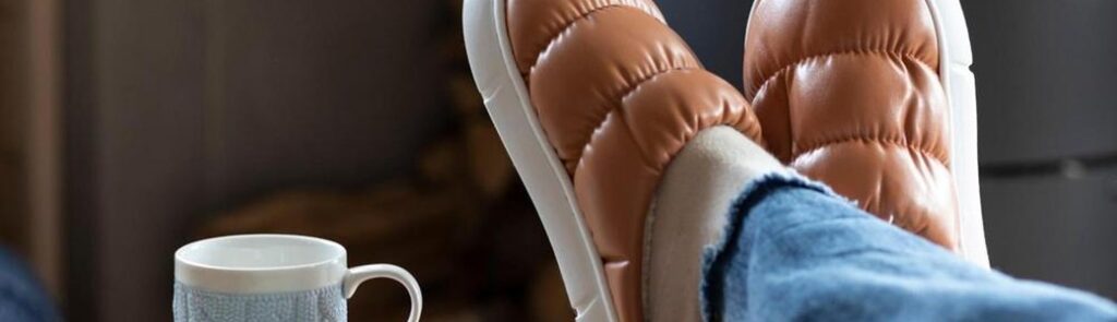 A person sitting with their feet up.